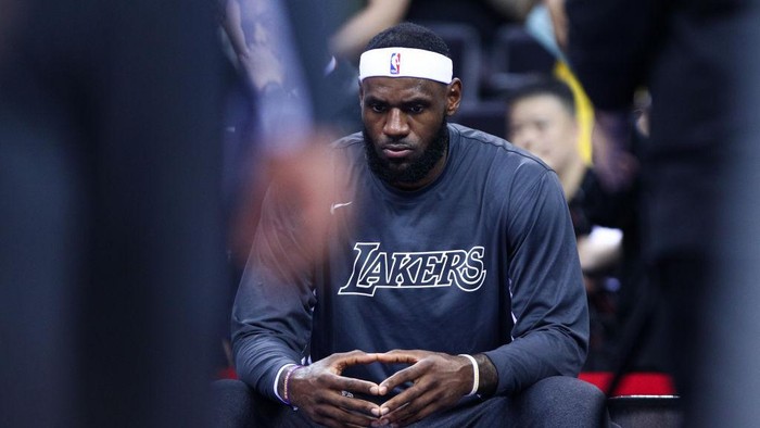 SHENZHEN, CHINA - OCTOBER 12: LeBron James #23 of the Los Angeles Lakers looks on before the match against the Brooklyn Nets during a preseason game as part of 2019 NBA Global Games China at Shenzhen Universiade Center on October 12, 2019 in Shenzhen, Guangdong, China. (Photo by Zhong Zhi/Getty Images)