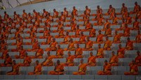 Diselenggarakan di masa pandemi virus Corona, upacara Magha Puja digelar dengan menerapkan protokol kesehatan yang ketat. 