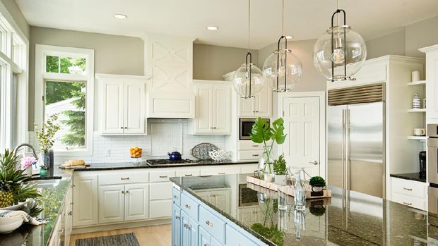 +++NOTE TO INSPECTOR: Photo artwork on the counter is taken by me, see property release.+++A contemporary kitchen with open concept design and bar counter in a modern home.