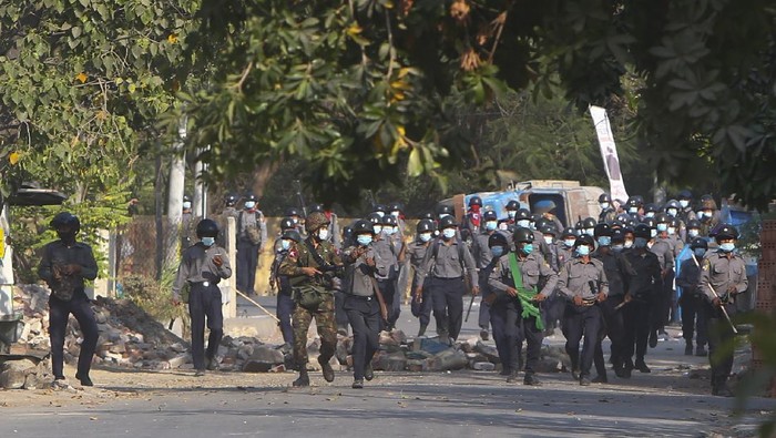 A wounded protester is carried during a protest against the military coup in Mandalay, Myanmar, Sunday, Feb. 28, 2021. Security forces in Myanmar used lethal force as they intensified their efforts to break up protests a month after the military staged a coup. At least four people were reportedly killed on Sunday. (AP Photo)