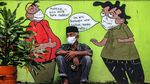 Foto: Kilas Balik 1 Tahun Corona di Indonesia