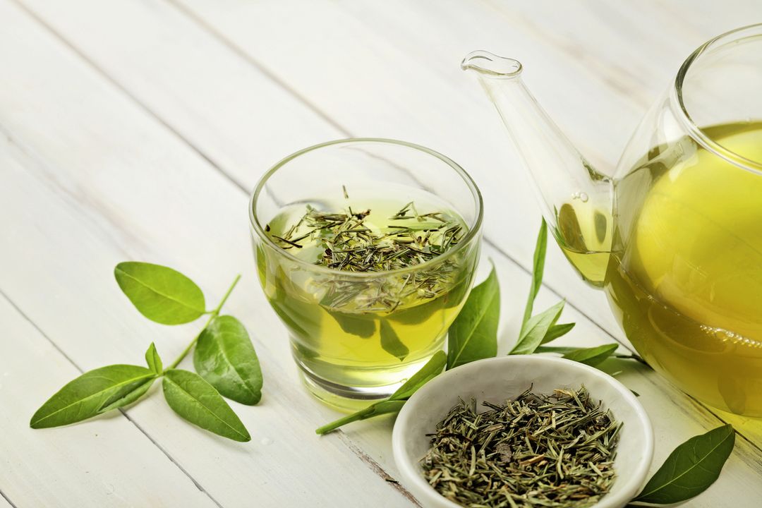 tea cup with tea leaves