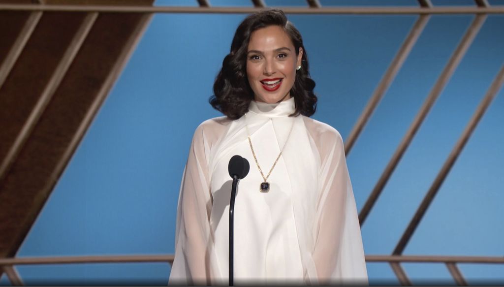In this video grab issued Sunday, Feb. 28, 2021, by NBC, Gal Gadot presents the award for best foreign language motion picture at the Golden Globe Awards. (NBC via AP)