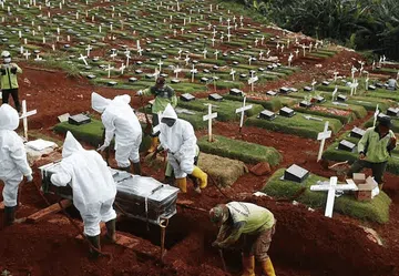 Foto: Kilas Balik 1 Tahun Corona di Indonesia