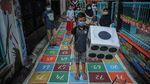 Cegah Anak Kecanduan Gadget Lewat Mural Permainan Tradisional