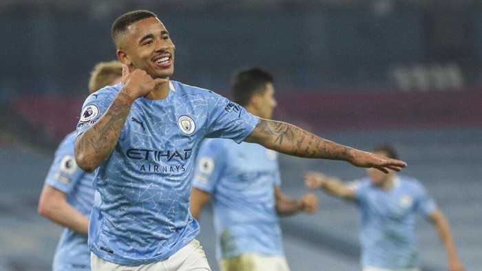 Manchester Citys Gabriel Jesus celebrates after scoring his team second goal during the English Premier League soccer match between Manchester City and Wolves at the Etihad stadium in Manchester, England, Tuesday, March 2, 2021. (Carl Recine/Pool via AP)