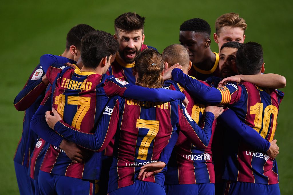 Barcelona BARCELONA, SPAIN - MARCH 03: Martin Braithwaite of FC Barcelona celebrates with Trincao, Antoine Griezmann and Lionel Messi after scoring their side's third goal during the Copa del Rey Semi Final Second Leg match between FC Barcelona and Sevilla at Camp Nou on March 03, 2021 in Barcelona, Spain. Sporting stadiums around Spain remain under strict restrictions due to the Coronavirus Pandemic as Government social distancing laws prohibit fans inside venues resulting in games being played behind closed doors. (Photo by David Ramos/Getty Images)