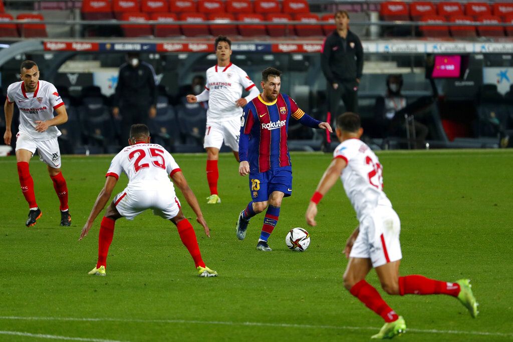 Lionel Messi Barcelona's Lionel Messi runs with the ball during the the Copa del Rey semifinal, second leg, soccer match between FC Barcelona and Sevilla FC at the Camp Nou stadium in Barcelona, Spain, Wednesday March 3, 2021. (AP Photo/Joan Monfort)