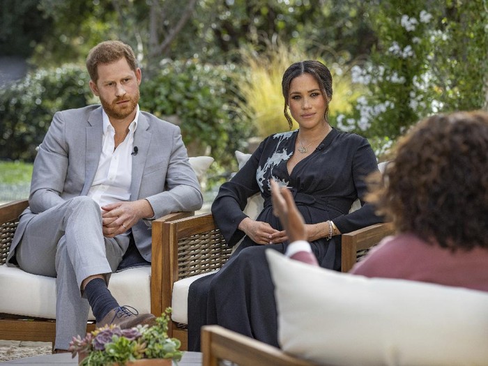 This image provided by Harpo Productions shows Meghan, The Duchess of Sussex, left, in conversation with Oprah Winfrey. (Joe Pugliese/Harpo Productions via AP)