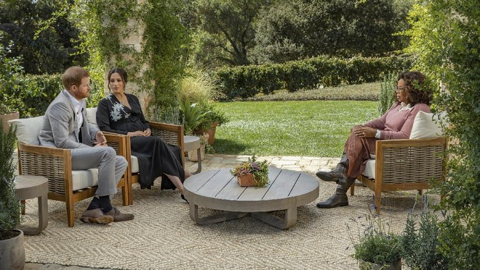 This image provided by Harpo Productions shows Meghan, The Duchess of Sussex, left, in conversation with Oprah Winfrey. (Joe Pugliese/Harpo Productions via AP)