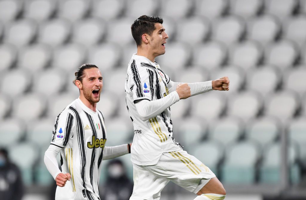 TURIN, ITALY - MARCH 06: Alvaro Morata of Juventus  celebrates with Adrien Rabiot  after scoring their team's third goal from the penalty spot during the Serie A match between Juventus  and SS Lazio at Allianz Stadium on March 06, 2021 in Turin, Italy. Sporting stadiums around Italy remain under strict restrictions due to the Coronavirus Pandemic as Government social distancing laws prohibit fans inside venues resulting in games being played behind closed doors. (Photo by Valerio Pennicino/Getty Images)