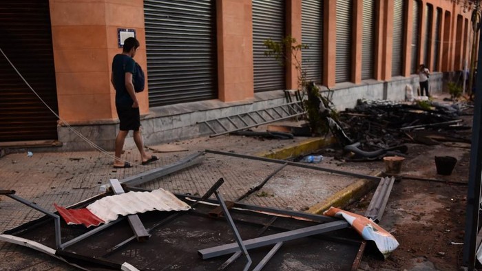 View of damages at the Ministry of Finance a day after protesters set it on fire during a protest against corruption and lacks in the health system, demanding the resignation of Paraguayan President Mario Abdo Benitez, in Asuncion, on March 6, 2021. (Photo by NORBERTO DUARTE / AFP)