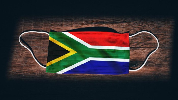 enlarged coronavirus, covid-19 under the flag of South Africa. Pandemic of respiratory disease. 3D rendering