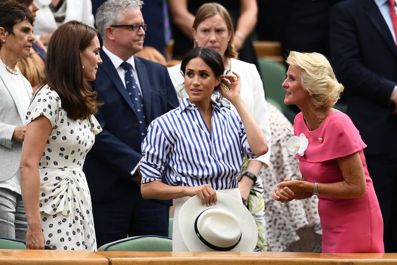 LONDON, ENGLAND - JULY 14:  Catherine, Duchess of Cambridge, Meghan, Duchess of Sussex and Gill Brook react after Novak Djokovic of Serbia beat Rafael Nadal of Spain in the Men's Singles semi-final on day twelve of the Wimbledon Lawn Tennis Championships at All England Lawn Tennis and Croquet Club on July 14, 2018 in London, England.  (Photo by Clive Mason/Getty Images)