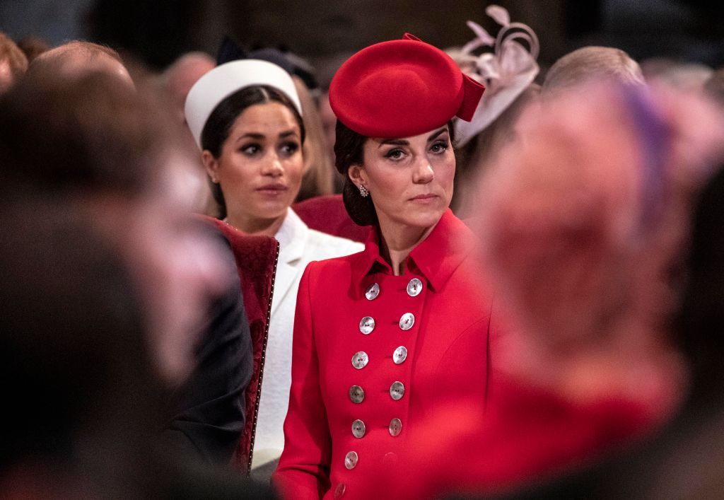 Kate Middleton dan Meghan Markle LONDON, ENGLAND - MARCH 11: Catherine, The Duchess of Cambridge sits near Meghan, Duchess of Sussex as they attend the Westminster Abbey Commonwealth day service on March 11, 2019 in London, England. Commonwealth Day has a special significance this year, as 2019 marks the 70th anniversary of the modern Commonwealth, with old ties and new links enabling cooperation towards social, political and economic development which is both inclusive and sustainable. The Commonwealth represents a global network of 53 countries and almost 2.4 billion people, a third of the worlds population, of whom 60 percent are under 30 years old. Each year the Commonwealth adopts a theme upon which the Service is based. This years theme A Connected Commonwealth speaks of the practical value and global engagement made possible as a result of cooperation between the culturally diverse and widely dispersed family of nations, who work together in friendship and goodwill. The Commonwealths governments, institutions and people connect at many levels, including through parliaments and universities. They work together to protect the natural environment and the ocean which connects many Commonwealth nations, shore to shore. Cooperation on trade encourages inclusive economic empowerment for all people - particularly women, youth and marginalised communities. The Commonwealths friendly sporting rivalry encourages people to participate in sport for development and peace. (Photo by Richard Pohle - WPA Pool/Getty Images)