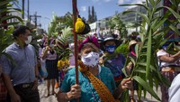 . Peringatan Hari Perempuan Sedunia juga digelar di Kota Guatemala pada Minggu (7/3/2021) waktu setempat. Para perempuan dari berbagai daerah turun ke jalan untuk ikut serta dalam aksi tersebut. AP Photo/Moises Castillo.