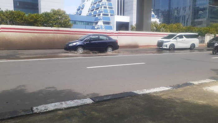 Jl HR Rasuna Said yang rusak kini sudah diperbaiki, Selasa (9/2/2021).