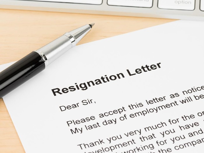 Resignation letter resign with pen and keyboard