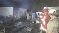 Kebakaran menghanguskan 57 rumah toko dan kios di Pasar Tapung Hilir, Kampar, Riau. Pasangan suami-istri, Lubis dan Siti Aisyah, tewas terbakar. (Dok Polres Kampar).