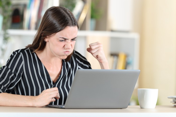bully cyber bullying concept. people using notebook computer laptop for social media interactions with notification icons of hate speech and mean comment in social network
