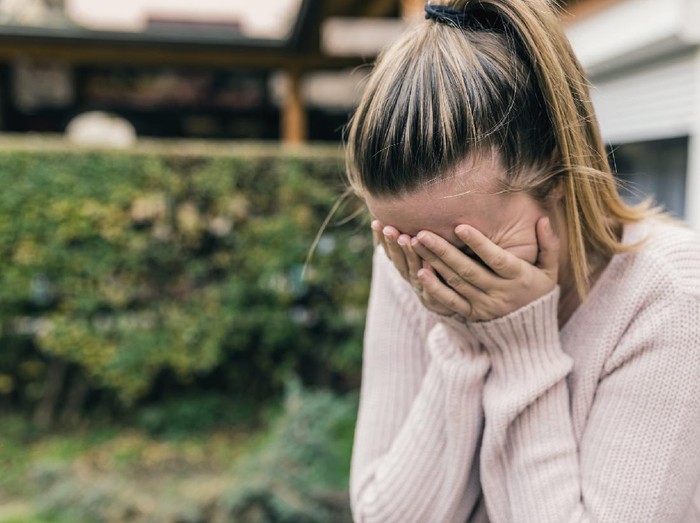Upset girl with a phone