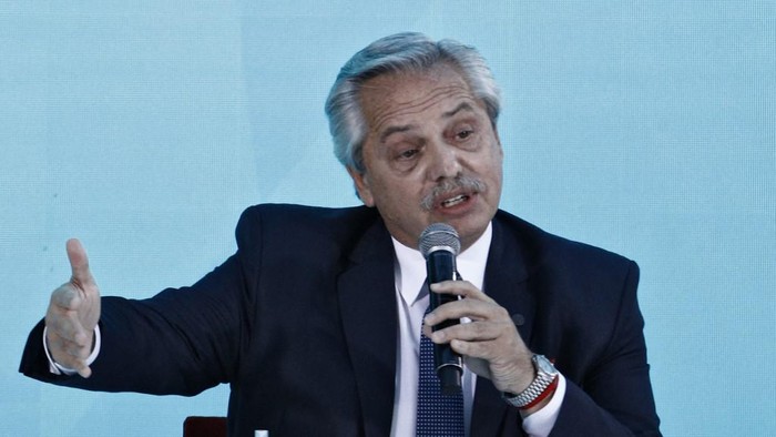 Argentinas President Alberto Fernandez speaks during the promulgation ceremony of the abortion law known as Voluntary Interruption of Pregnancy Law (IVE in Spanish) in Buenos Aires, on January 14, 2021. - Fernandez sign the law that allows voluntary terminations up to 14 weeks of pregnancy, which was passed by the senate on December 30, 2020. (Photo by Emiliano LASALVIA / AFP)