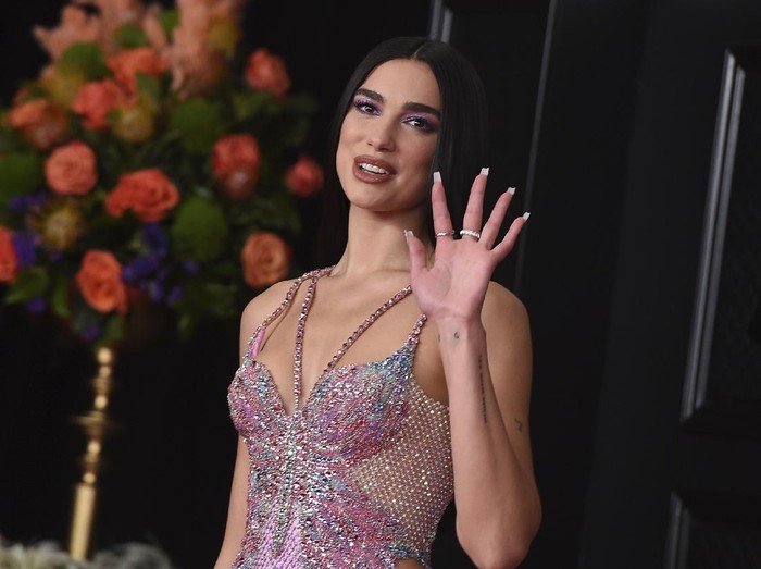 Dua Lipa arrives at the 63rd annual Grammy Awards at the Los Angeles Convention Center on Sunday, March 14, 2021. (Photo by Jordan Strauss/Invision/AP)