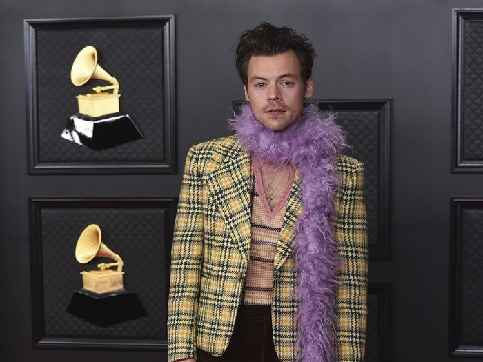 Harry Styles poses in the press room at the 63rd annual Grammy Awards at the Los Angeles Convention Center on Sunday, March 14, 2021. (Photo by Jordan Strauss/Invision/AP)