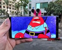 Foto HP menyatu dengan benda nyata