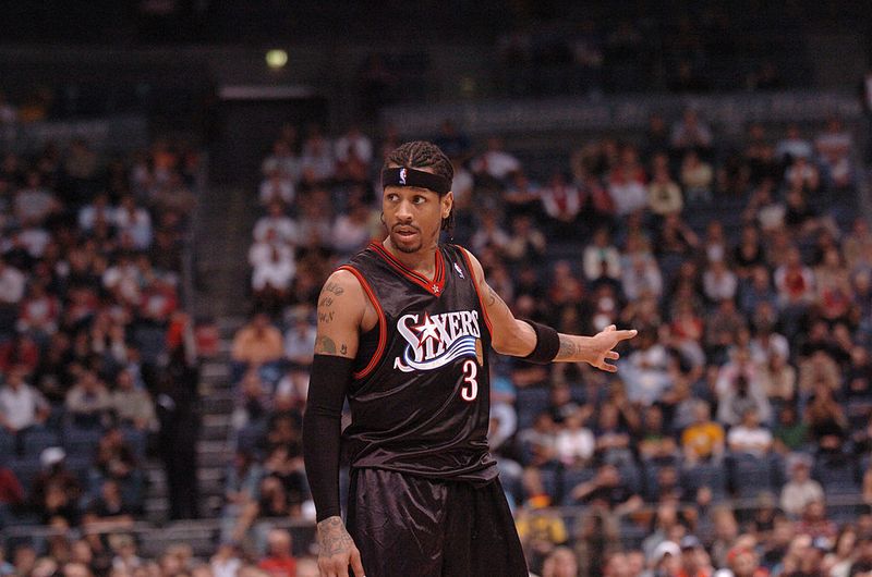 134586643 Philadelphia 76ers Allen Iverson makes a point during the NBA Europe Live Tour presented by EA Sports on October 11, 2006 at the Kölnarena in Cologne, Germany. (Photo by Mansoor Ahmed/Getty Images)
