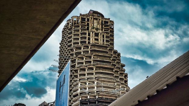 Bangkok, Thailand 08.20.2019 Sathorn Unique Tower, Ghost Tower is an unfinished skyscraper in the Thai capital city Bangkok. Planned as a high-rise condominium complex