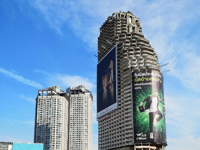 Bangkok, Thailand 08.20.2019 Sathorn Unique Tower, Ghost Tower is an unfinished skyscraper in the Thai capital city Bangkok. Planned as a high-rise condominium complex