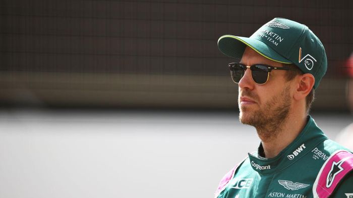 Sebastian Vettel BAHRAIN, BAHRAIN - MARCH 12: Sebastian Vettel of Germany and Aston Martin F1 Team looks on from the grid during Day One of F1 Testing at Bahrain International Circuit on March 12, 2021 in Bahrain, Bahrain. (Photo by Joe Portlock/Getty Images)