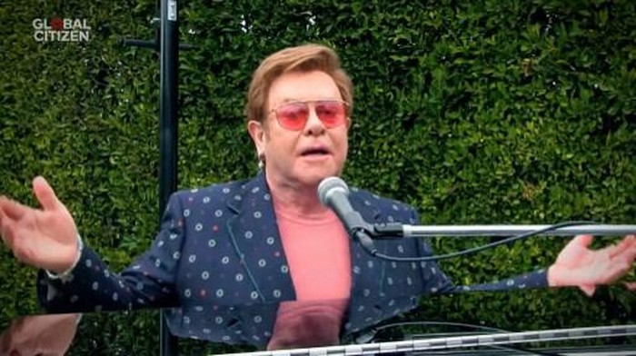 UNSPECIFIED LOCATION - APRIL 18: In this screengrab, Sir Elton John performs during 