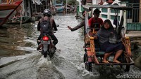 Tantangan Agus Kharir menjadi manti BRI adalah rob yang kerap melanda wilayah kerjanya.