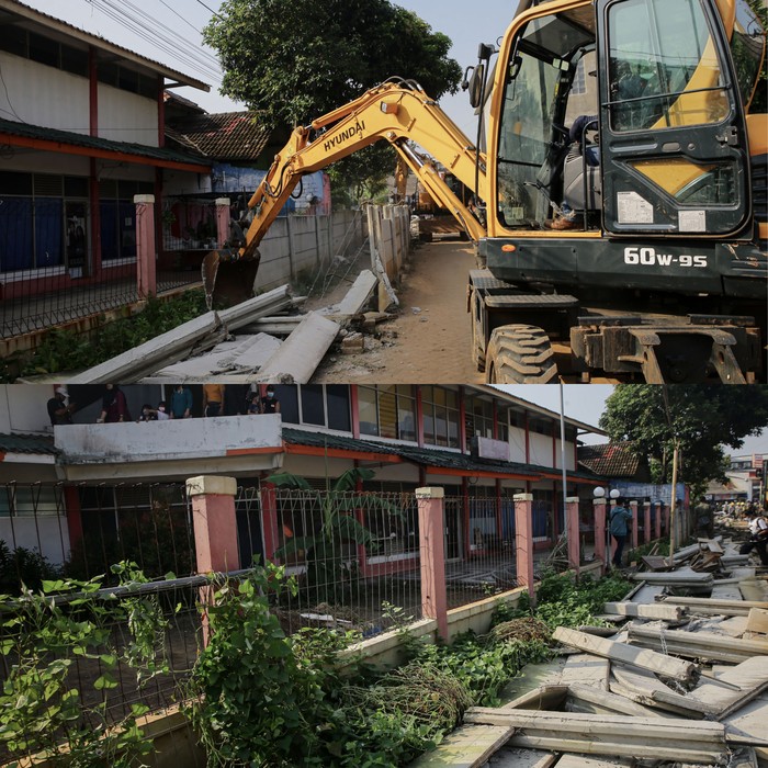 Tembok 2 meter di Ciledug dirobohkan. Tembok 2 meter di Ciledug dirobohkan.
