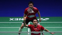 Mohammad Ahsan/Hendra Setiawan meraih juara ganda putra di tahun 2014 dan 2019. Oli SCARFF / AFP.