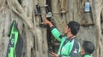 Siasat Pengemudi Ojek Online Menanti Pesanan