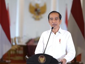 Jokowi Teken PP Atur Evakuasi TKI saat Perang-Wabah Penyakit