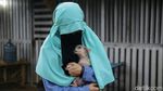 Melihat Lebih dekat Hesti Wanita Bercadar dan Puluhan Anjingnya