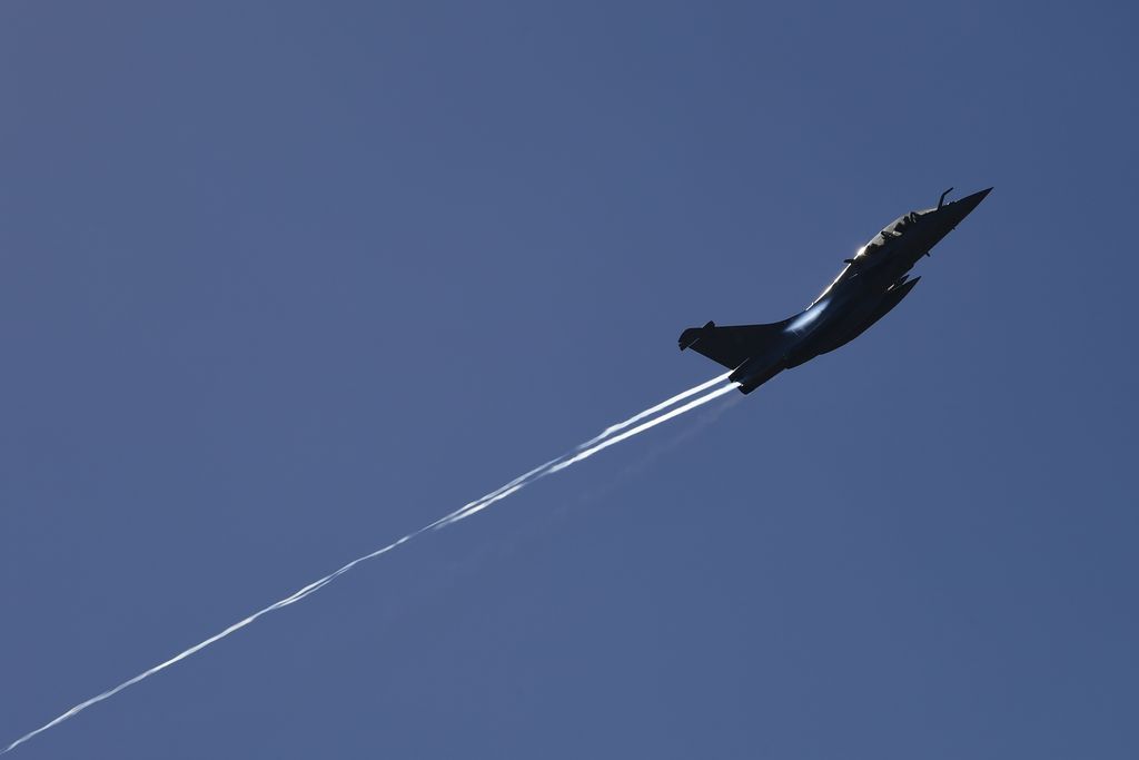 A Hellenic Airforce Mirage-2000 fighter jet manoeuvres during a joint military drill, at Tanagra military air base, about 82 kilometres (51miles) north of Athens, Greece, Thursday, Feb. 4, 2021. Greek and French military leaders observed an exercise by French Rafale fighter jets following a 2.3 billion euro deal for Greece to buy 18 of the aircraft as tensions grow with neighbor Turkey. (AP Photo/Michael Varaklas)