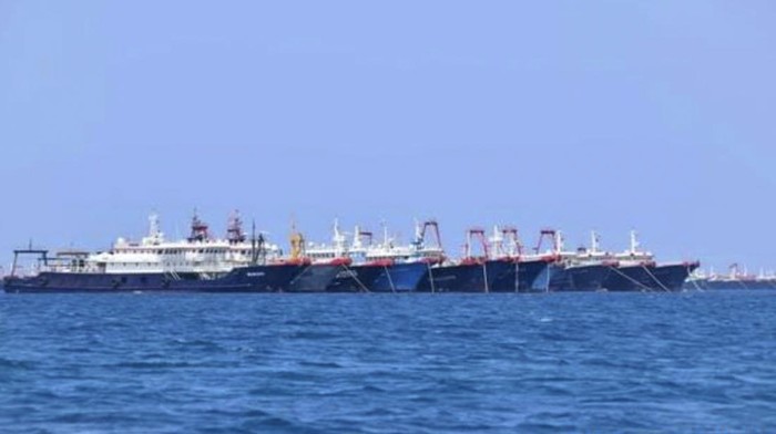 In this March 7, 2021, photo provided by the Philippine Coast Guard/National Task Force-West Philippine Sea, some of the 220 Chinese vessels are seen moored at Whitsun Reef, South China Sea. The Philippine government expressed concern after spotting more than 200 Chinese fishing vessels it believed were crewed by militias at a reef claimed by both countries in the South China Sea, but it did not immediately lodge a protest. (Philippine Coast Guard/National Task Force-West Philippine Sea via AP)