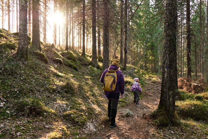 Mother and her daughter on the hiking trail on Kallio lake, Finland. (iStockphoto/Lev Karavanov)