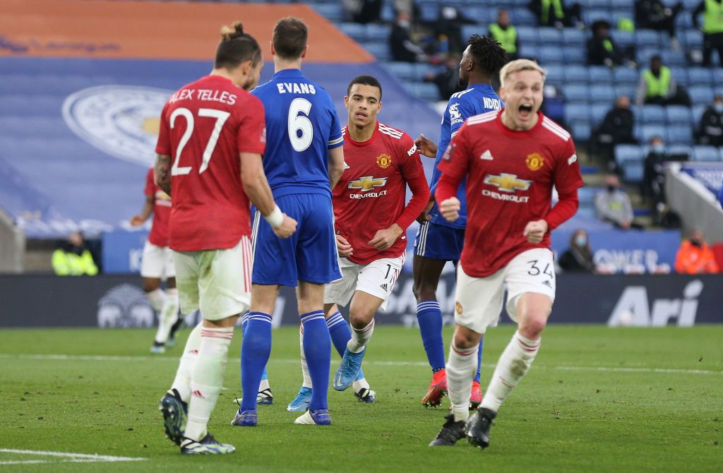 LEICESTER, ENGLAND - MARCH 21: Mason Greenwood of Manchester United celebrates after scoring their side's first goal during the Emirates FA Cup Quarter Final  match between Leicester City and Manchester United at The King Power Stadium on March 21, 2021 in Leicester, England. Sporting stadiums around the UK remain under strict restrictions due to the Coronavirus Pandemic as Government social distancing laws prohibit fans inside venues resulting in games being played behind closed doors.  (Photo by Alex Pantling/Getty Images)