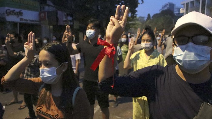 Armed police patrol a street in downtown Yangon, Myanmar, Sunday, March 21, 2021. Protests against the coup continued in cities and town across the country, including in Mandalay and Yangon. (AP Photo)