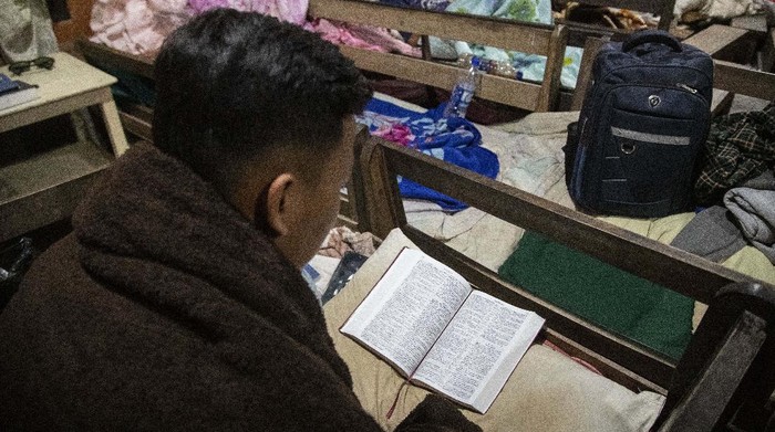 Police officers who fled Myanmar following a military coup rest at an undisclosed place in Mizoram, a state bordering Myanmar, India, Friday, March 19, 2021. Indian villagers in Mizoram have given shelter to 34 police personnel and one firefighter who crossed into India over the last two weeks. (AP Photo/Anupam Nath)