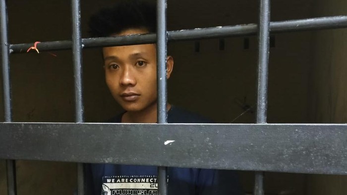K (25), pria yang diduga memenggal dan mengarak kepala ayahnya keliling kampung di Lampung.