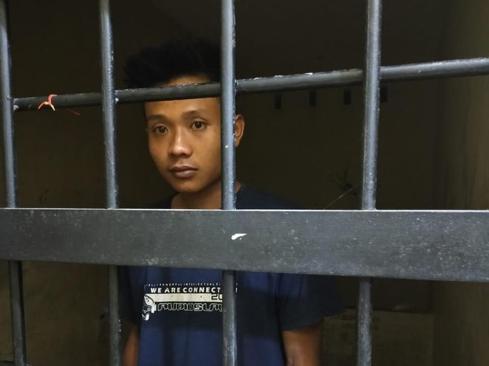 K (25), pria yang diduga memenggal dan mengarak kepala ayahnya keliling kampung di Lampung.