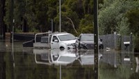 Banjir yang disebabkan oleh hujan deras ini merupakan banjir terparah dari 50 tahun terakhir di Australia. AP Photo/Mark Baker.