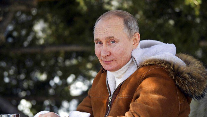 Photoshoot Vladimir Putin In this photo made available on Sunday, March 21, 2021, Russian President Vladimir Putin poses for a photo in a taiga forest in Russias Siberian region. Putin and Russia Defense Minister Sergei Shoigu are spending the weekend in Siberia said Kremlin spokesman Dmitry Peskov. (Alexei Druzhinin, Sputnik, Kremlin Pool Photo via AP)